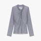 Maglia con drappeggio e collo alto