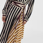 Abito lungo a righe con fascia