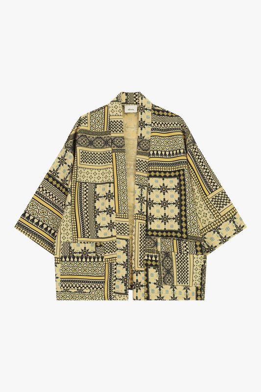 Cappotto fantasia patchwork con maniche ampie