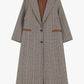Cappotto con dettagli in contrasto