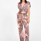 Pantaloni ampi con motivo decorativo