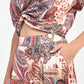 Pantaloni ampi con motivo decorativo