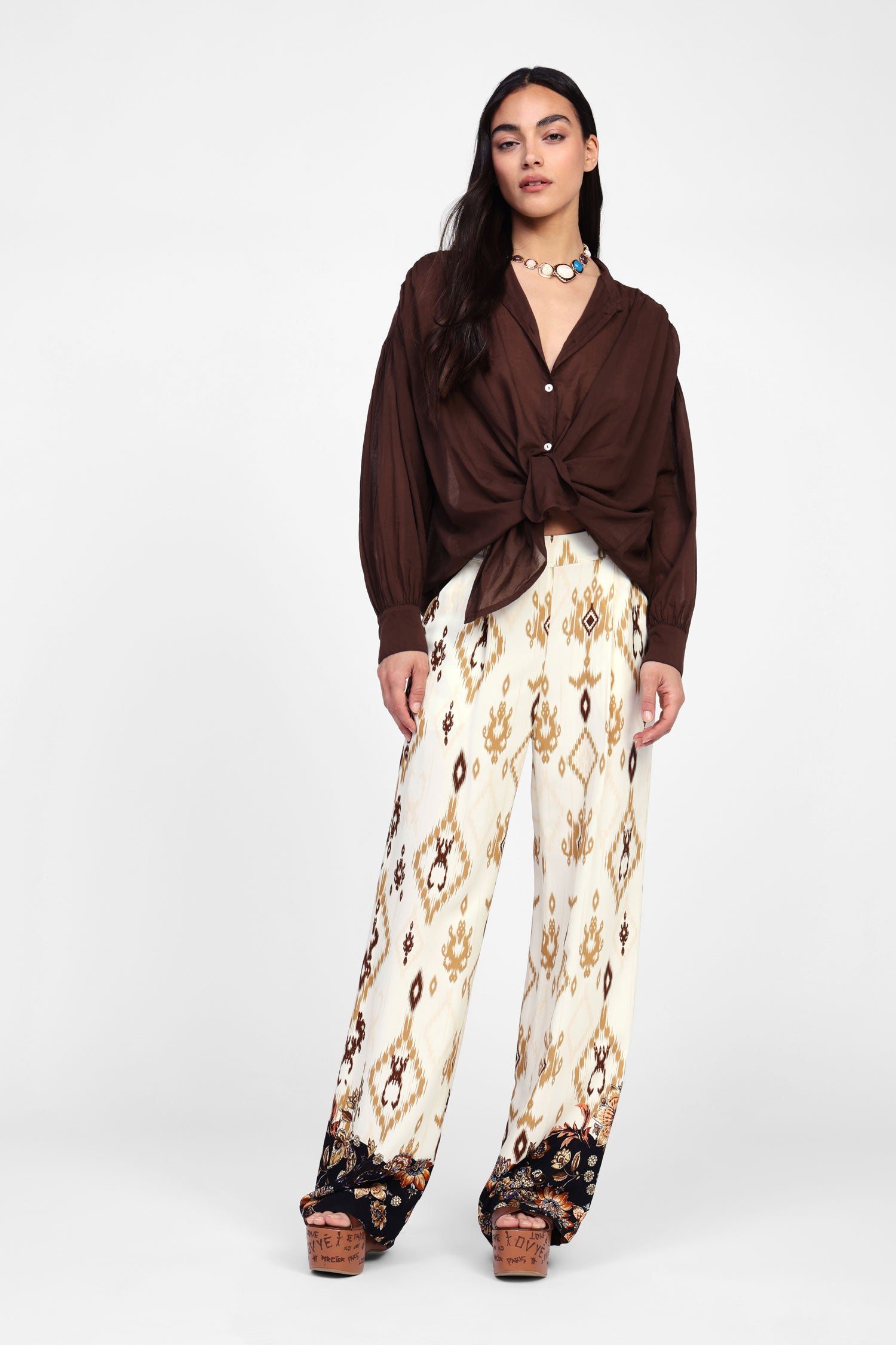 Pantaloni palazzo con motivi geometrici