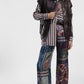 Pantaloni palazzo fantasia geometrica e floreale