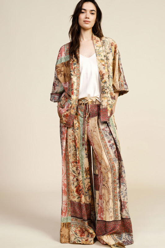 Pantaloni palazzo fantasia con vita alta e coulisse