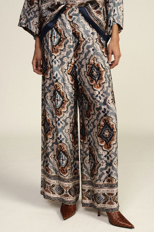 Pantaloni palazzo fantasia dettagli geometrici