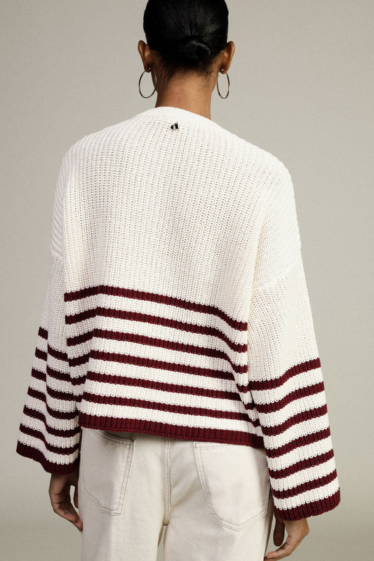 Maglione pullover a righe con scollo a v e bottoni