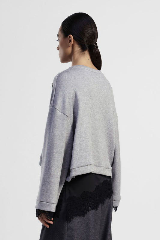 Maglione corto con maniche ampie e pizzo