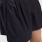 Shorts con pannello sovrapposto e dettagli a righe
