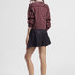 Shorts con pannello sovrapposto e dettagli a righe