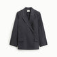 Blazer monopetto con ampi revers e tasche frontali
