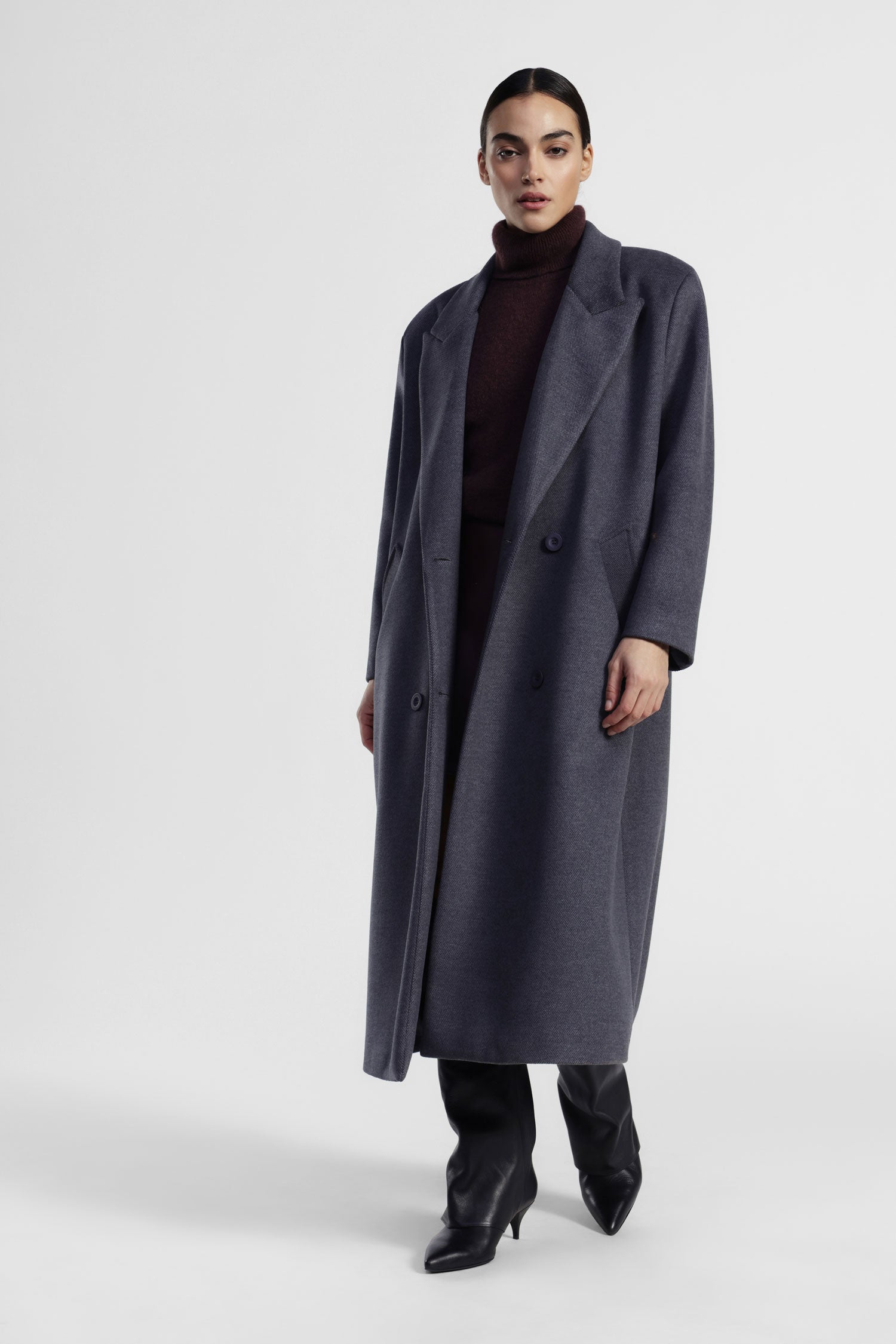 Cappotto lungo doppio petto con tasche laterali