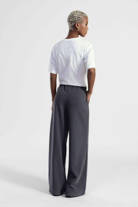 Trousers palazzo vita alta con tasche laterali