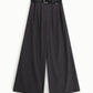 Pantaloni palazzo con cintura in vita e pince