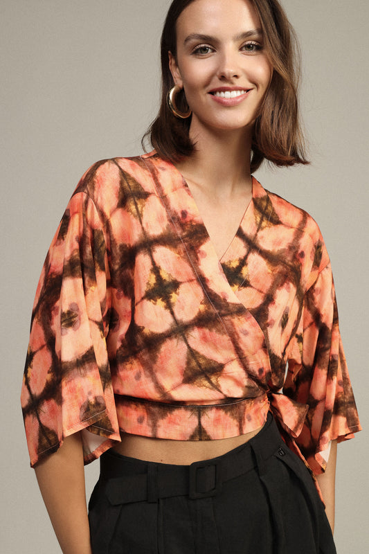 Blusa stampa fantasia con maniche ampie e nodo