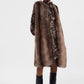 Gilet lungo con pelliccia sintetica