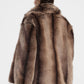 Eco-fur corta con ampio revers e volume