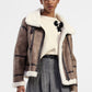 Giacca in eco-pelliccia con zip