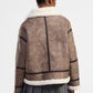 Giacca in eco-pelliccia con zip