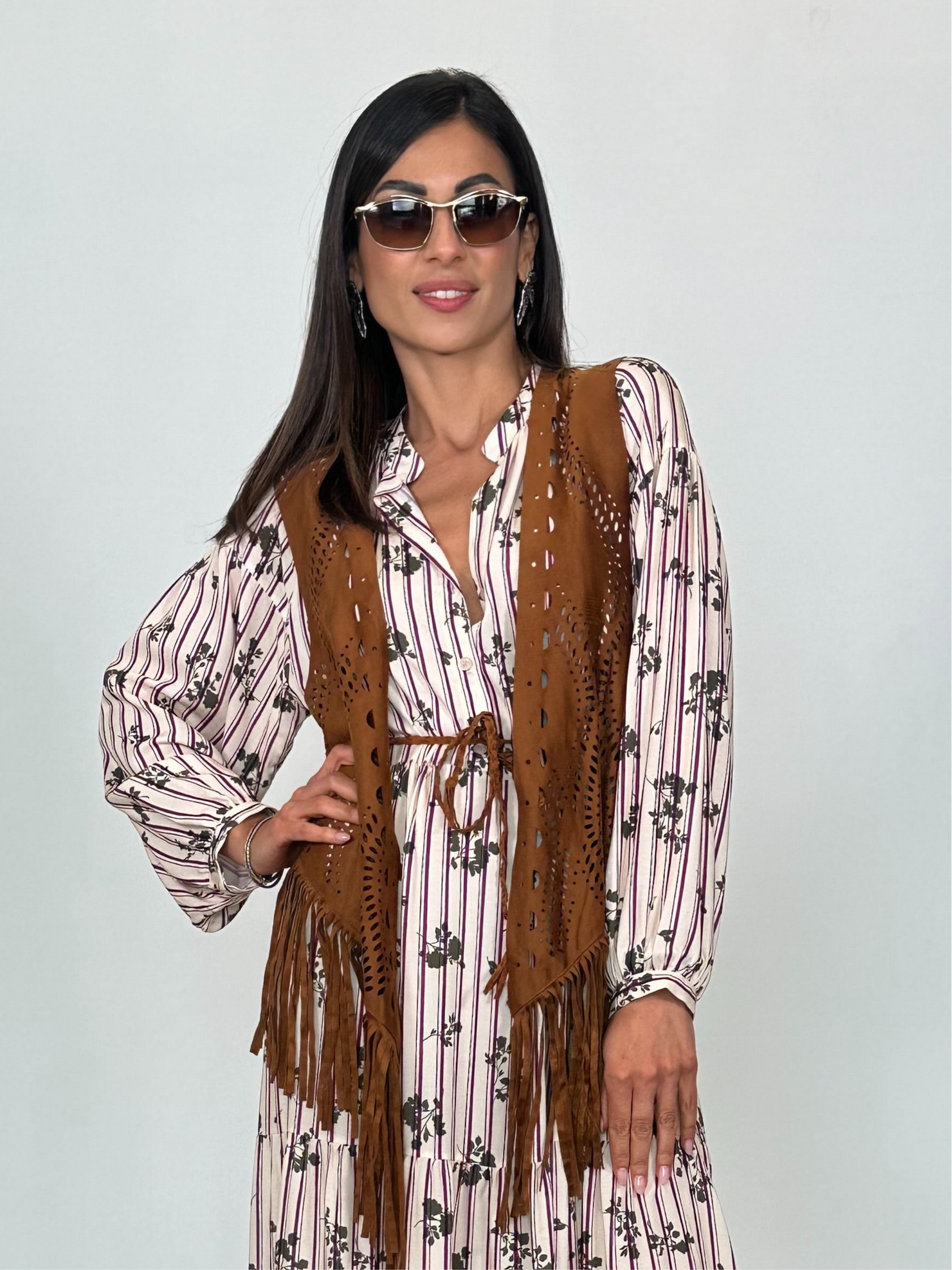 Gilet traforato con frange lunghe