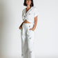 Pantalone ampio con paillettes decorative