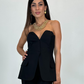 Taglio sinuoso con tasche funzionali