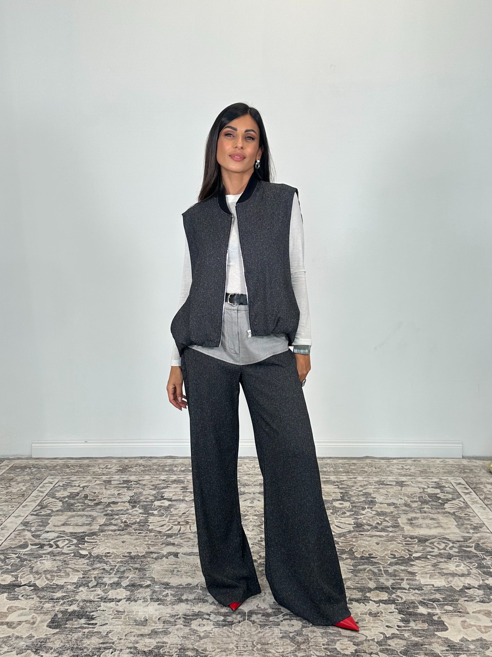 Gilet con zip e fondo arricciato