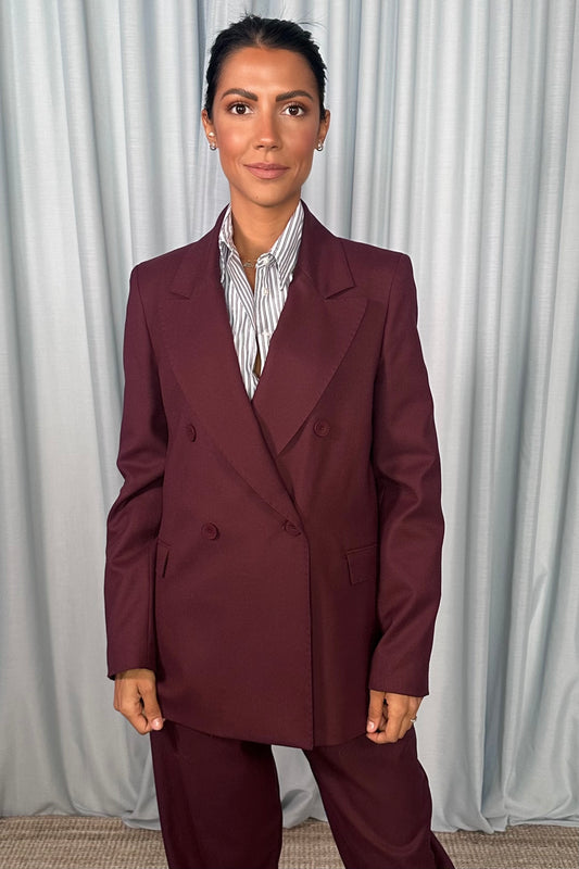 Blazer doppiopetto con tasche a filetto