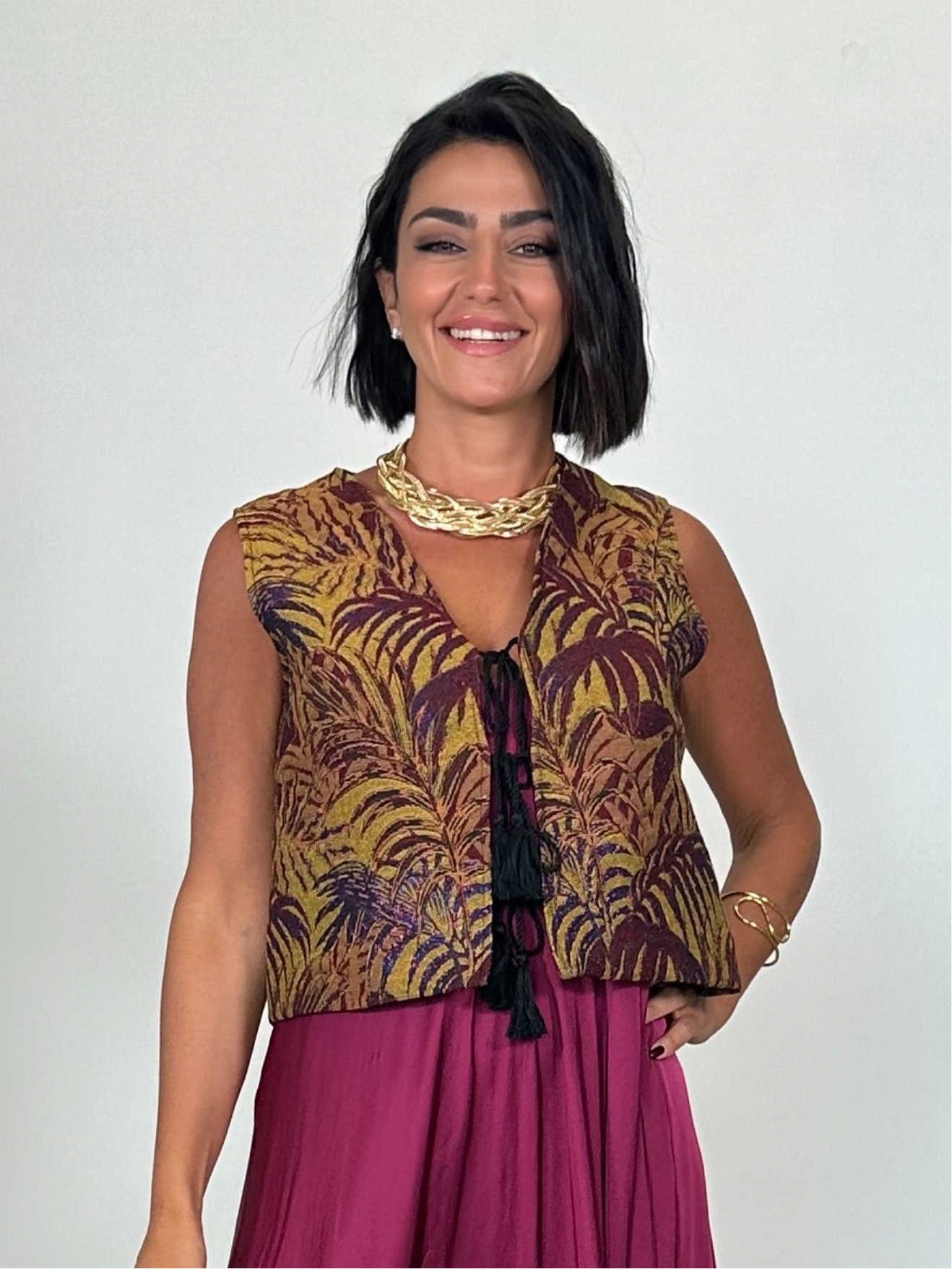 Gilet con motivo floreale e frange