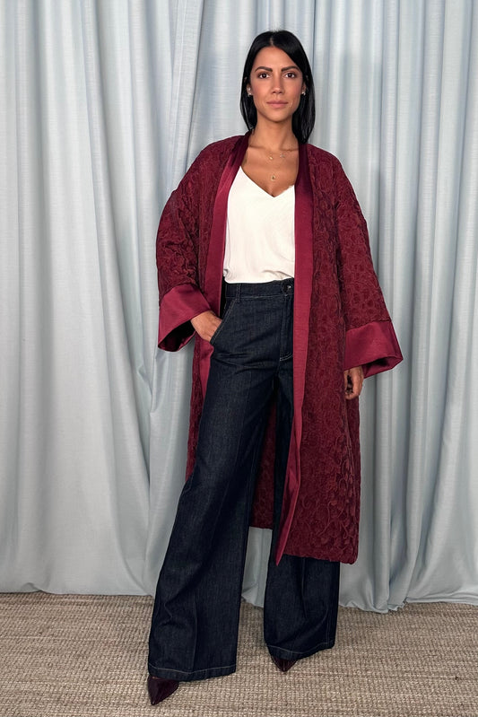 Cappotto ampio jacquard con profili lisci