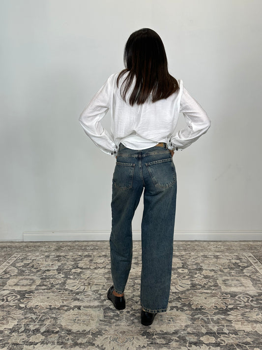 Jeans a gamba larga con vita media