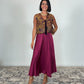 Gilet con motivo floreale e frange