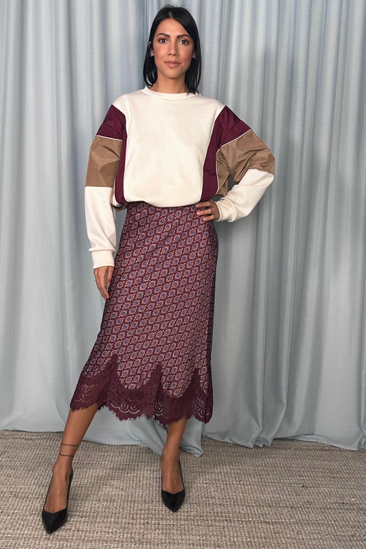 Gonna midi stampata con bordo in pizzo