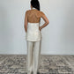 Gilet con spalle scoperte e tasche