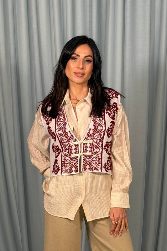 Gilet corto fantasia jacquard con chiusura gancio