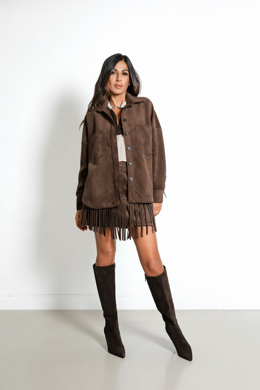 Gonna corta con frange e taglio a v