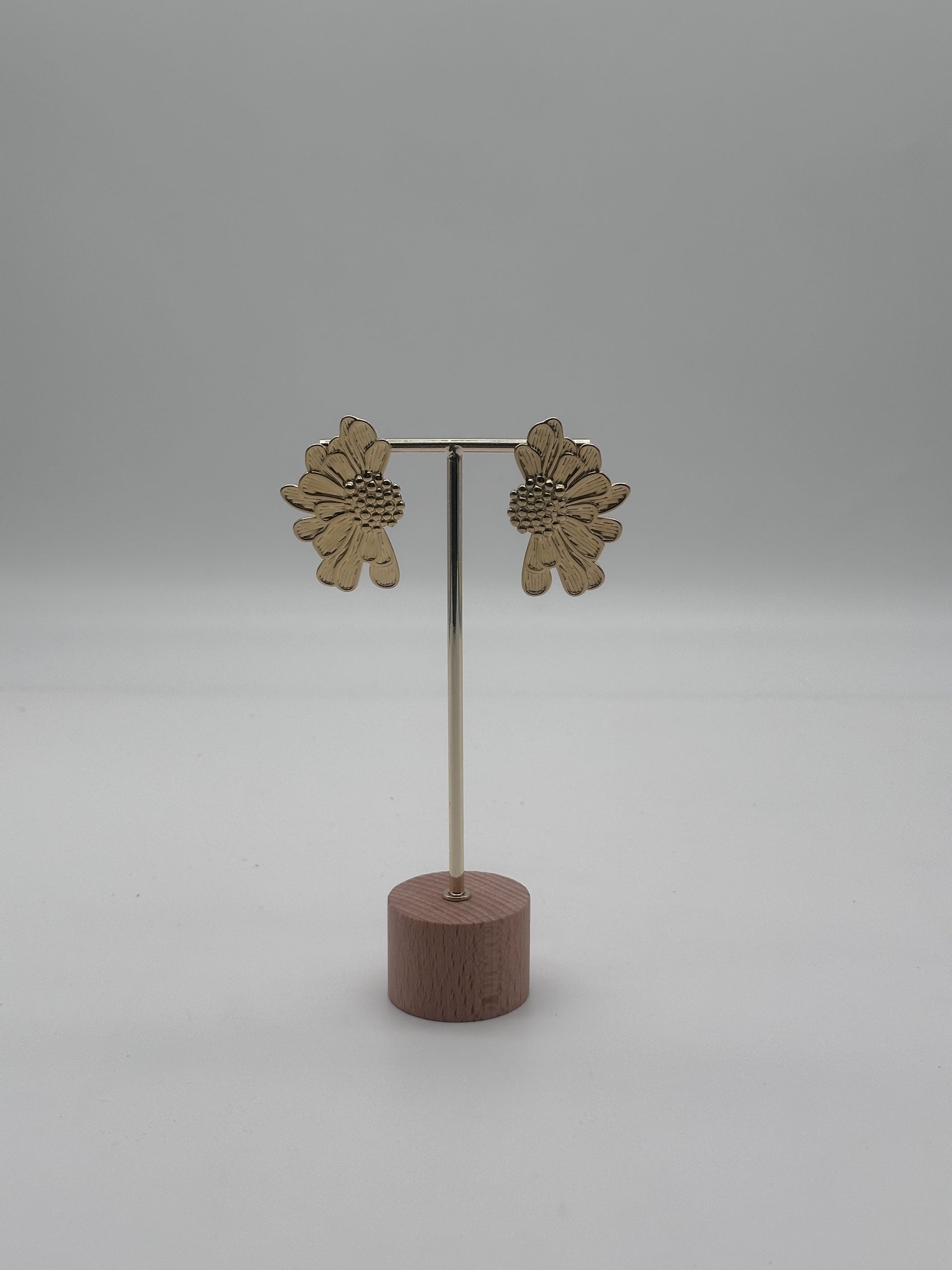 Orecchini metà fiore