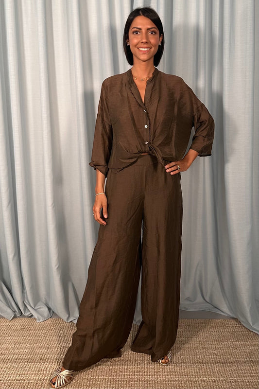 Pantaloni palazzo ampi con vita elastica e trasparenza