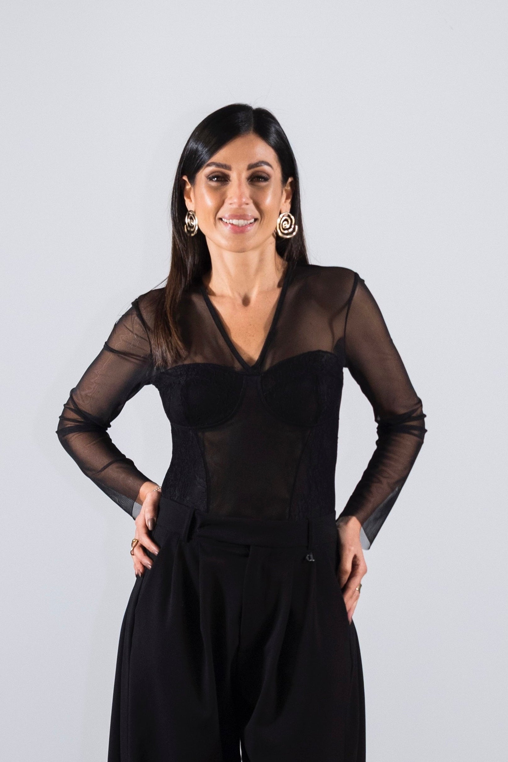 Body trasparente con maniche lunghe e dettagli a pannello