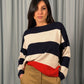 Maglione a righe con maniche lunghe e fondo a costine