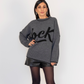 Pullover girocollo con scritta rock e bordo a contrasto