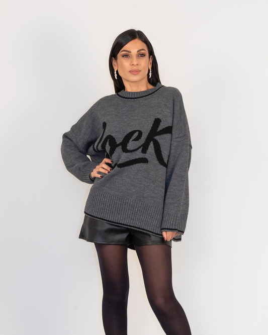 Pullover girocollo con scritta rock e bordo a contrasto