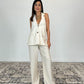 Gilet con spalle scoperte e tasche