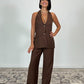 Gilet con spalle scoperte e tasche
